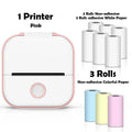 Pink printer with white, colorful paper rolls on a white background